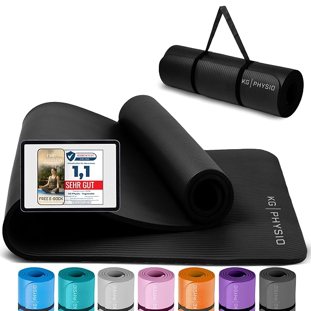 KG PHYSIO schwarze gerippte Matte halb aufgerollt, darauf eine Karte „Warentest Online 1,1“ und darunter sieben Farben aufgereiht
